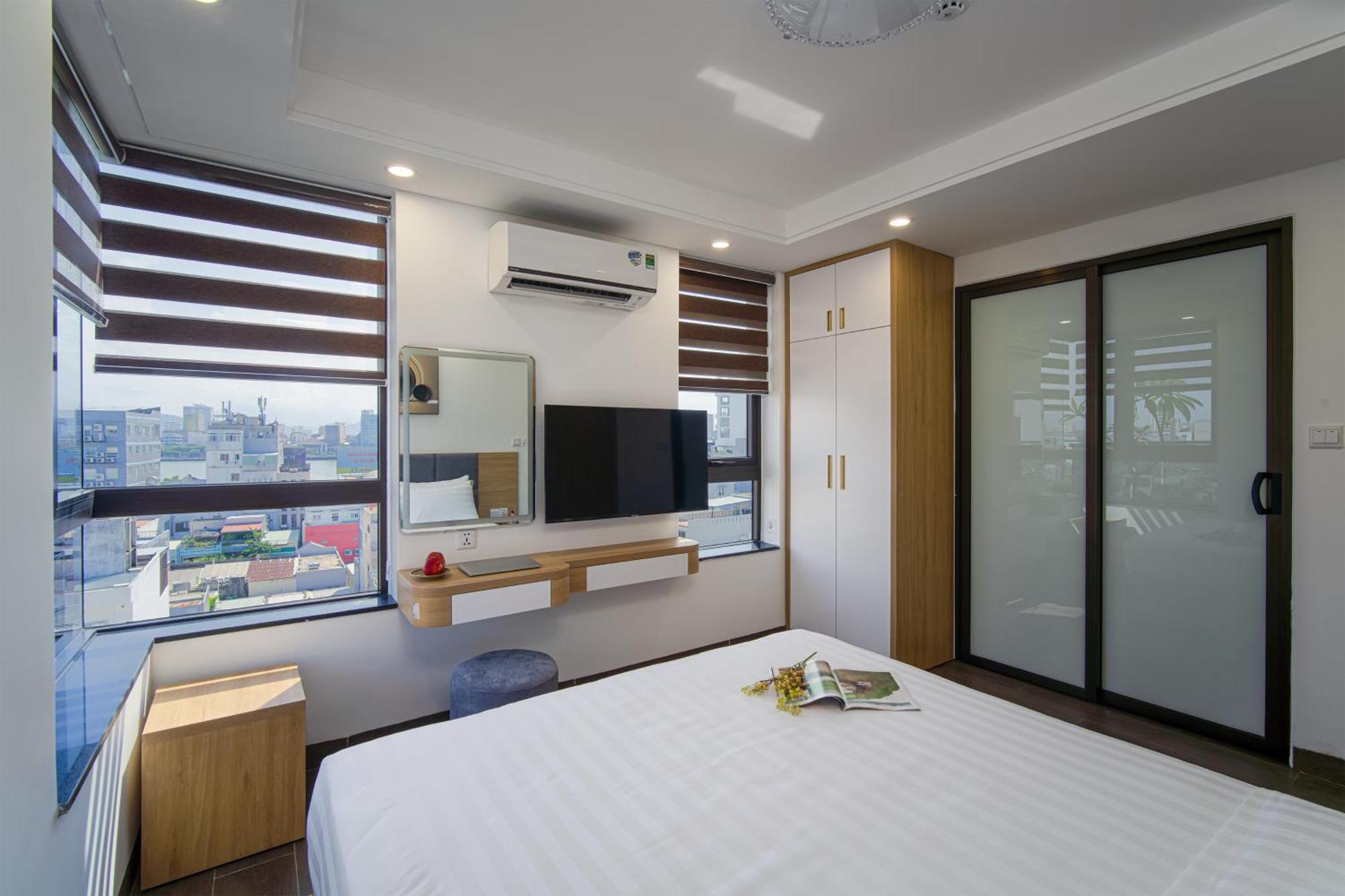 دا نانغ Hsuites Riverside Hotel And Apartment الغرفة الصورة